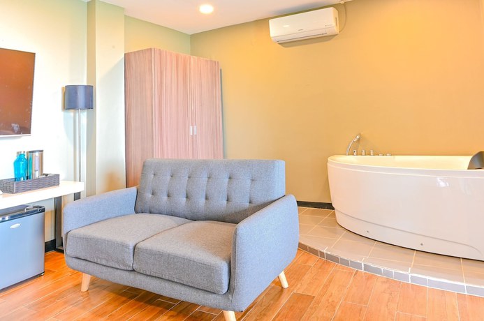 Imagen de la habitación del Hotel Capital O 890 Nami Tagaytay. Foto 14