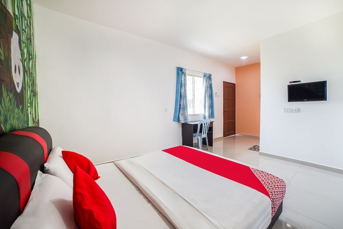 Imagen de la habitación del Hotel Capital O 89374 Ohana Restaurant and Homestay. Foto 11