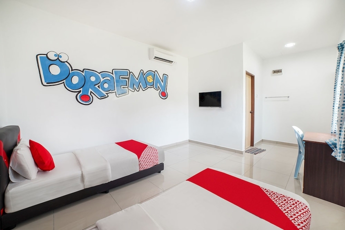 Imagen de la habitación del Hotel Capital O 89374 Ohana Restaurant and Homestay. Foto 15