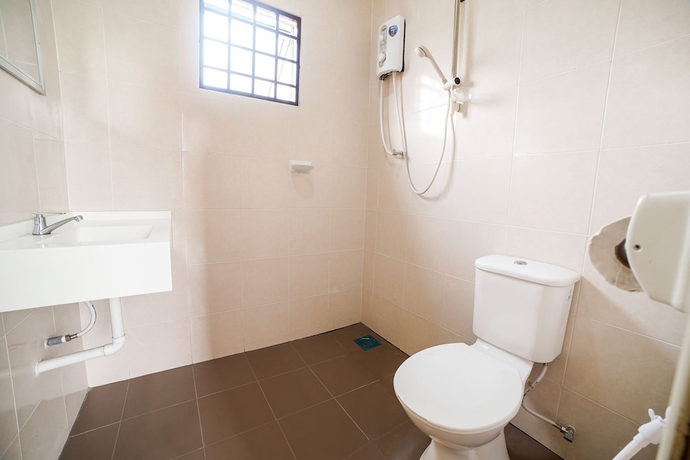 Imagen de la habitación del Hotel Capital O 89374 Ohana Restaurant and Homestay. Foto 16