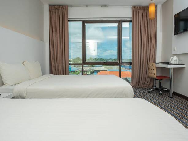 Imagen general del Hotel Capital O 90083 Riverfront Inn. Foto 1
