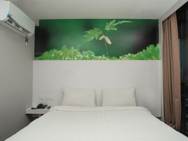Imagen de la habitación del Hotel Capital O 90083 Riverfront Inn. Foto 8