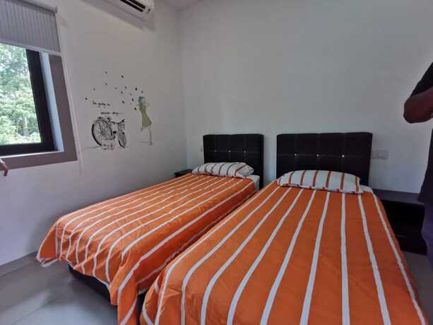 Imagen de la habitación del Hotel Capital O 90088 Mbp Leisure Resort. Foto 4