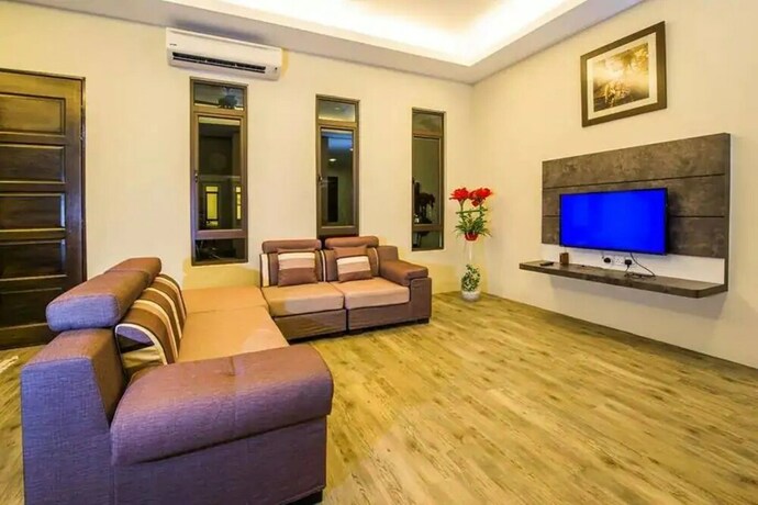 Imagen de la habitación del Hotel Capital O 90088 Mbp Leisure Resort. Foto 7