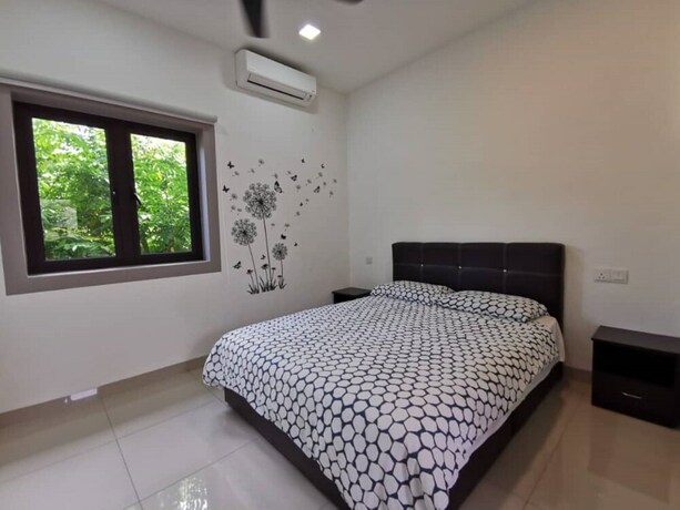 Imagen de la habitación del Hotel Capital O 90088 Mbp Leisure Resort. Foto 8