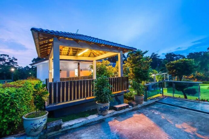 Imagen de los interiores del Hotel Capital O 90088 Mbp Leisure Resort. Foto 15