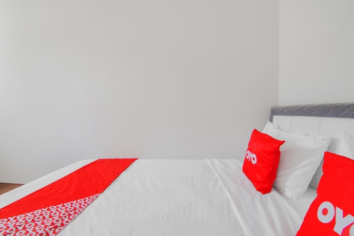 Imagen de la habitación del Hotel Capital O 90342 Kemang Garden. Foto 9