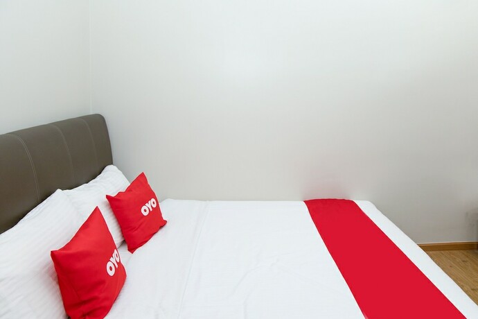 Imagen de la habitación del Hotel Capital O 90406 Mirani. Foto 16
