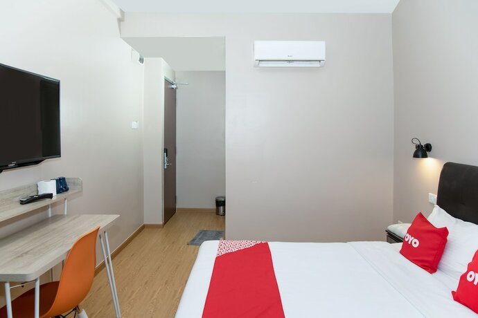 Imagen de la habitación del Hotel Capital O 90406 Mirani. Foto 17