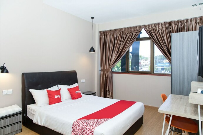 Imagen de la habitación del Hotel Capital O 90406 Mirani. Foto 19