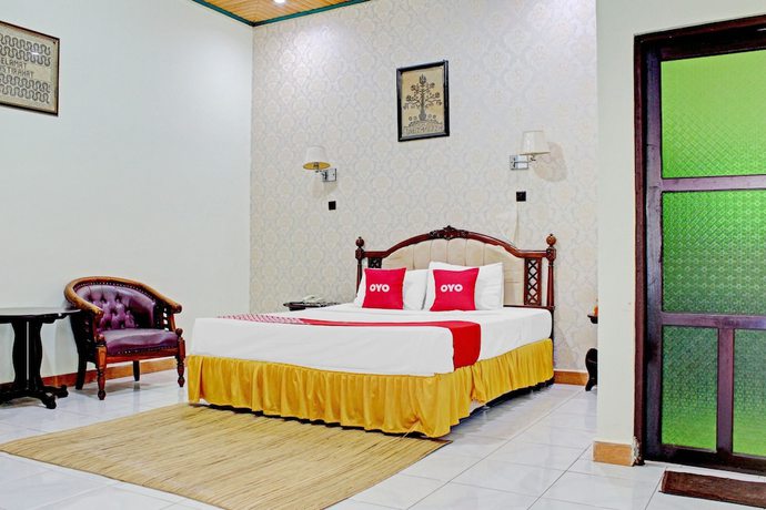 Imagen de la habitación del Hotel Capital O 90417 Batu Suli Internasional. Foto 2