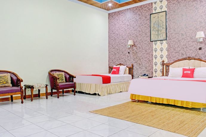 Imagen de la habitación del Hotel Capital O 90417 Batu Suli Internasional. Foto 4