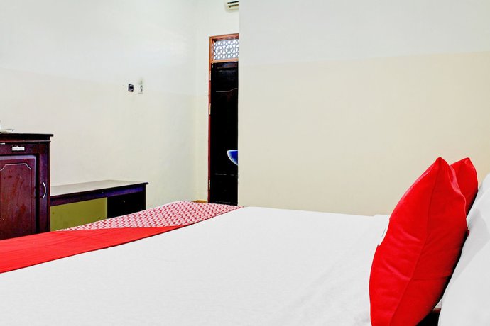 Imagen de la habitación del Hotel Capital O 90417 Batu Suli Internasional. Foto 5