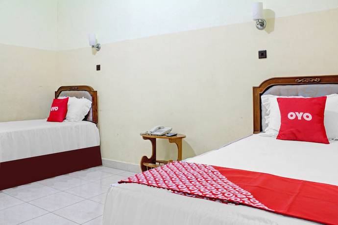 Imagen de la habitación del Hotel Capital O 90417 Batu Suli Internasional. Foto 7