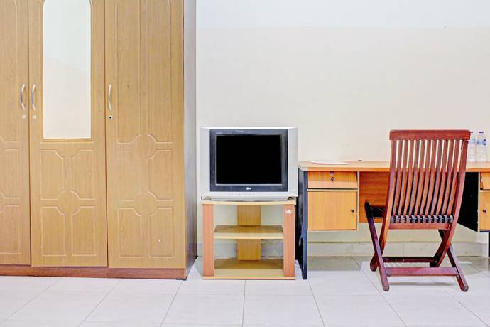 Imagen de la habitación del Hotel Capital O 90417 Batu Suli Internasional. Foto 8