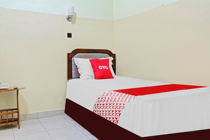 Imagen de la habitación del Hotel Capital O 90417 Batu Suli Internasional. Foto 11