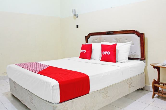 Imagen de la habitación del Hotel Capital O 90417 Batu Suli Internasional. Foto 12