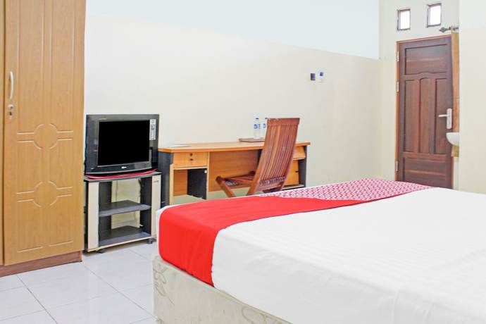 Imagen de la habitación del Hotel Capital O 90417 Batu Suli Internasional. Foto 13
