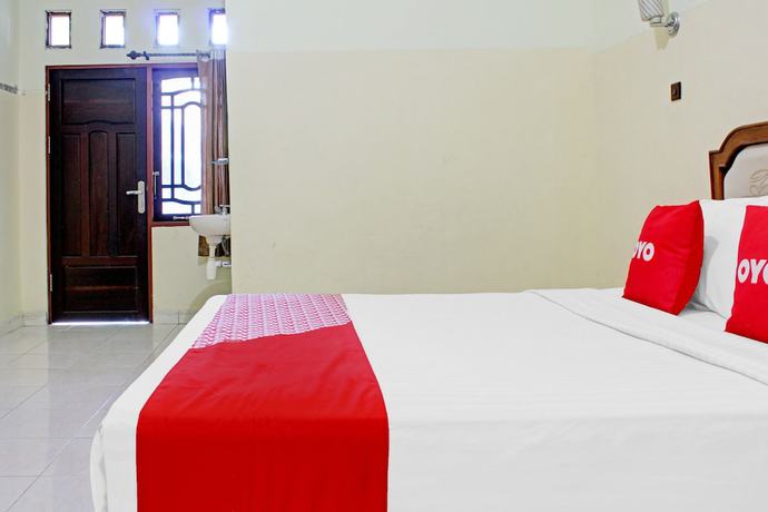 Imagen de la habitación del Hotel Capital O 90417 Batu Suli Internasional. Foto 15