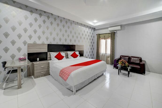 Imagen de la habitación del Hotel Capital O 90601 Meuligoe. Foto 19