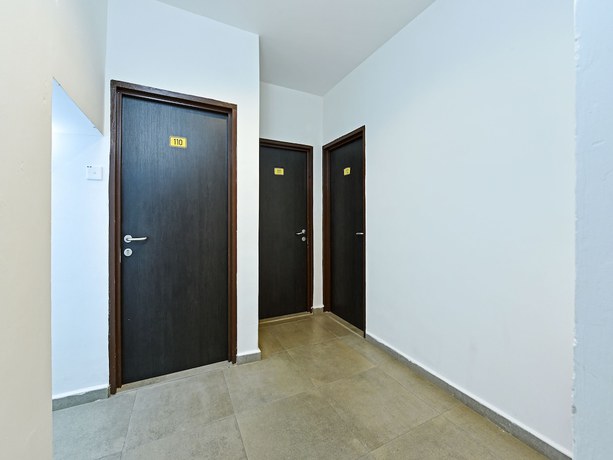 Imagen de los interiores del Hotel Capital O 90615 The Bed Hotel. Foto 17