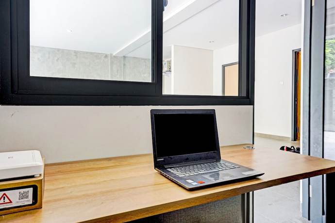 Imagen de los interiores del Hotel Capital O 90635 Tango Juliet Residence. Foto 14