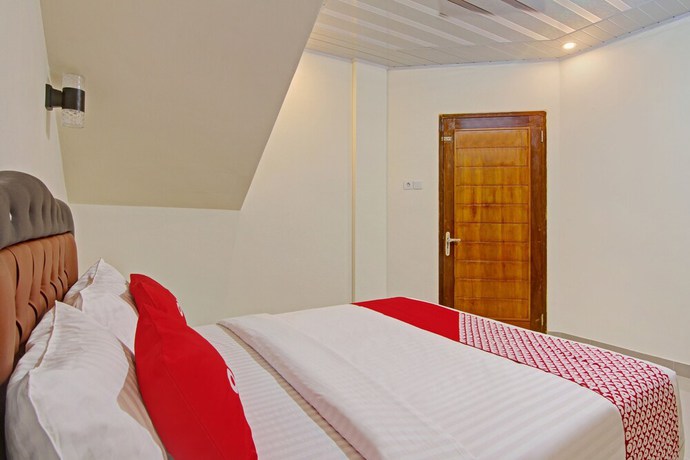 Imagen de la habitación del Hotel Capital O 90643 Suri Guest House Syariah. Foto 3