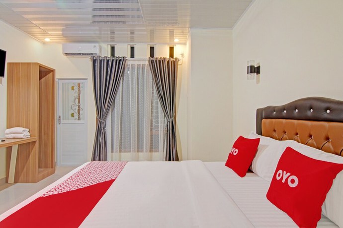 Imagen de la habitación del Hotel Capital O 90643 Suri Guest House Syariah. Foto 4