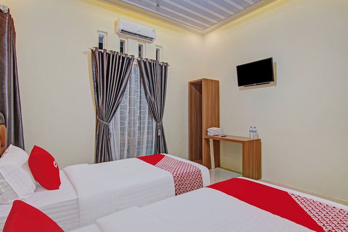 Imagen de la habitación del Hotel Capital O 90643 Suri Guest House Syariah. Foto 5