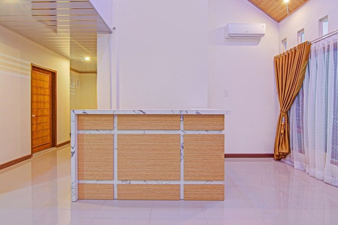 Imagen de los interiores del Hotel Capital O 90643 Suri Guest House Syariah. Foto 16