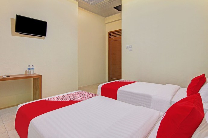 Imagen de la habitación del Hotel Capital O 90643 Suri Guest House Syariah. Foto 7