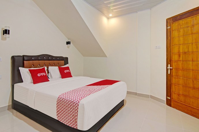 Imagen de la habitación del Hotel Capital O 90643 Suri Guest House Syariah. Foto 8