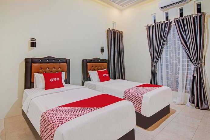 Imagen de la habitación del Hotel Capital O 90643 Suri Guest House Syariah. Foto 10