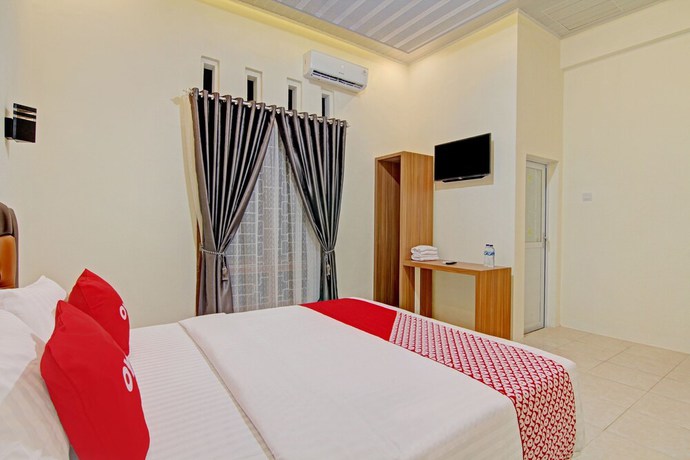 Imagen de la habitación del Hotel Capital O 90643 Suri Guest House Syariah. Foto 13