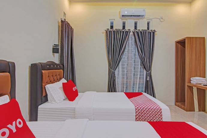 Imagen de la habitación del Hotel Capital O 90643 Suri Guest House Syariah. Foto 14