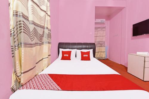 Imagen de la habitación del Hotel Capital O 90664 Rabi. Foto 19