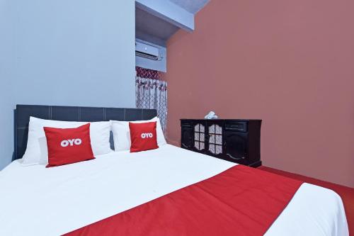 Imagen de la habitación del Hotel Capital O 90664 Rabi. Foto 20