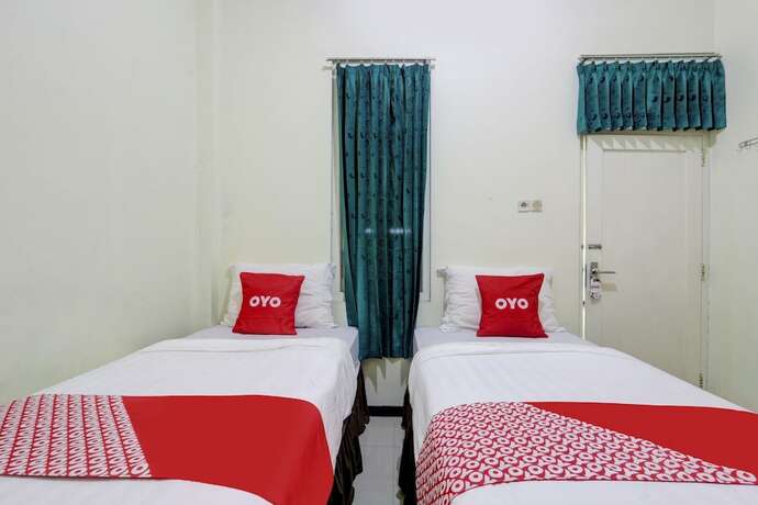 Imagen de la habitación del Hotel Capital O 90709 Djati Guest House. Foto 16