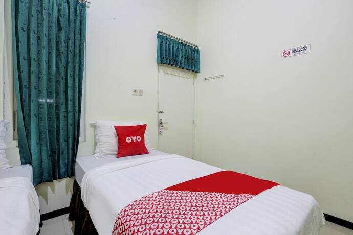 Imagen de la habitación del Hotel Capital O 90709 Djati Guest House. Foto 17