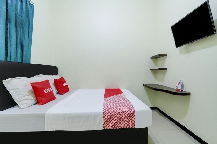 Imagen de la habitación del Hotel Capital O 90709 Djati Guest House. Foto 18