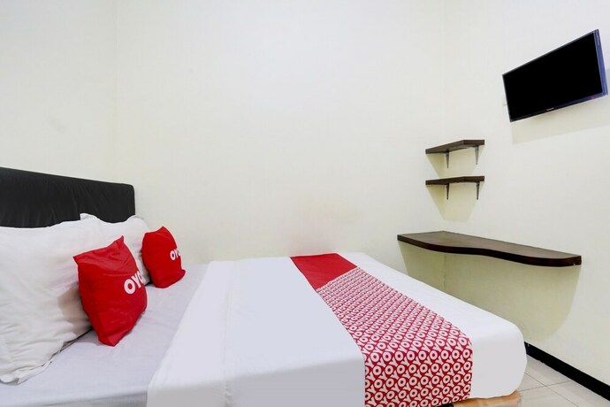 Imagen de la habitación del Hotel Capital O 90709 Djati Guest House. Foto 19