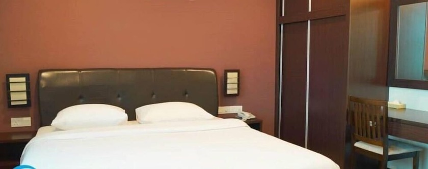 Imagen de la habitación del Hotel Capital O 90767 Rail. Foto 10