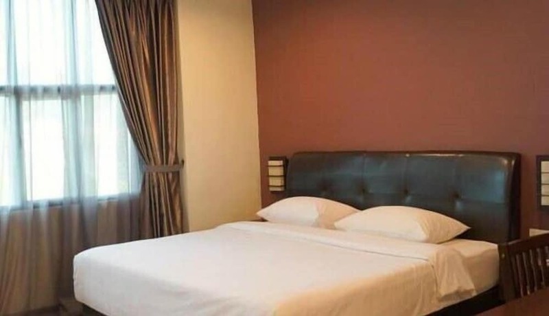 Imagen de la habitación del Hotel Capital O 90767 Rail. Foto 11