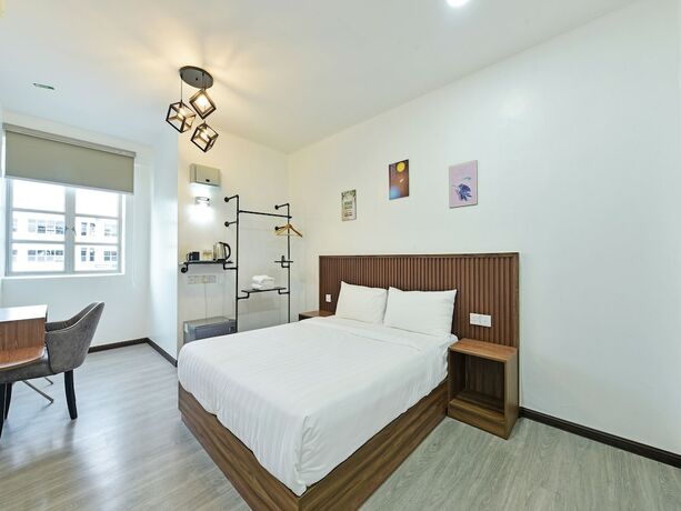 Imagen de la habitación del Hotel Capital O 90882 Padi. Foto 14