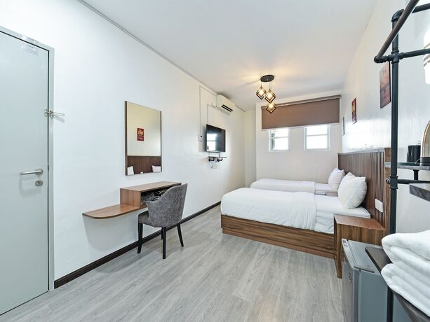 Imagen de la habitación del Hotel Capital O 90882 Padi. Foto 15