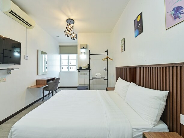 Imagen de la habitación del Hotel Capital O 90882 Padi. Foto 16