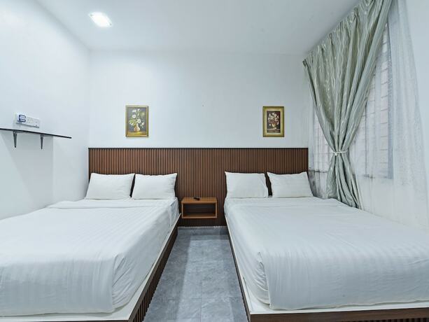 Imagen de la habitación del Hotel Capital O 90882 Padi. Foto 17