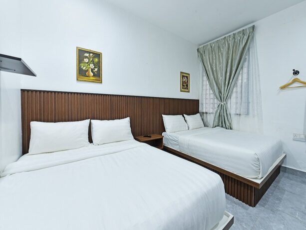 Imagen de la habitación del Hotel Capital O 90882 Padi. Foto 19