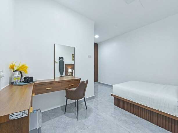 Imagen de la habitación del Hotel Capital O 90882 Padi. Foto 20