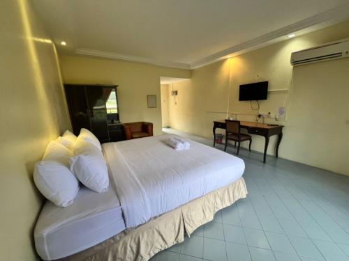 Imagen general del Hotel Capital O 91096 Usas Resort. Foto 2